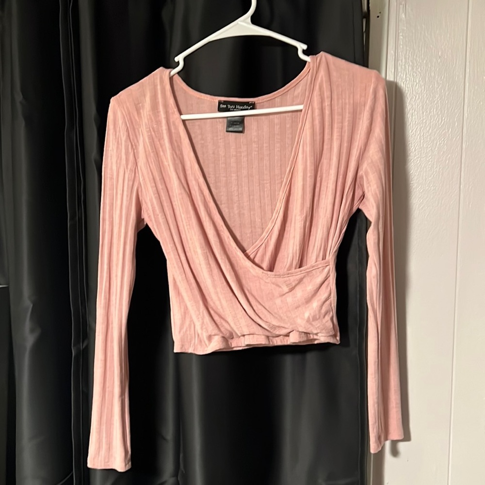 Light pink long sleeve crop top.